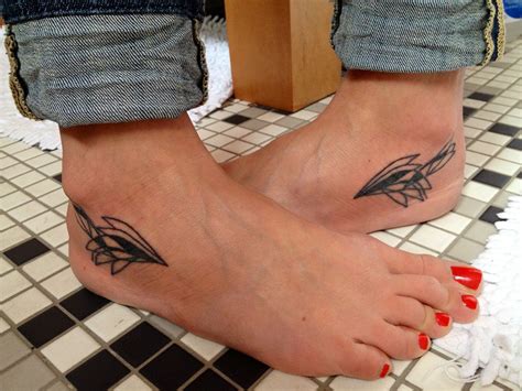 winged foot tattoo.